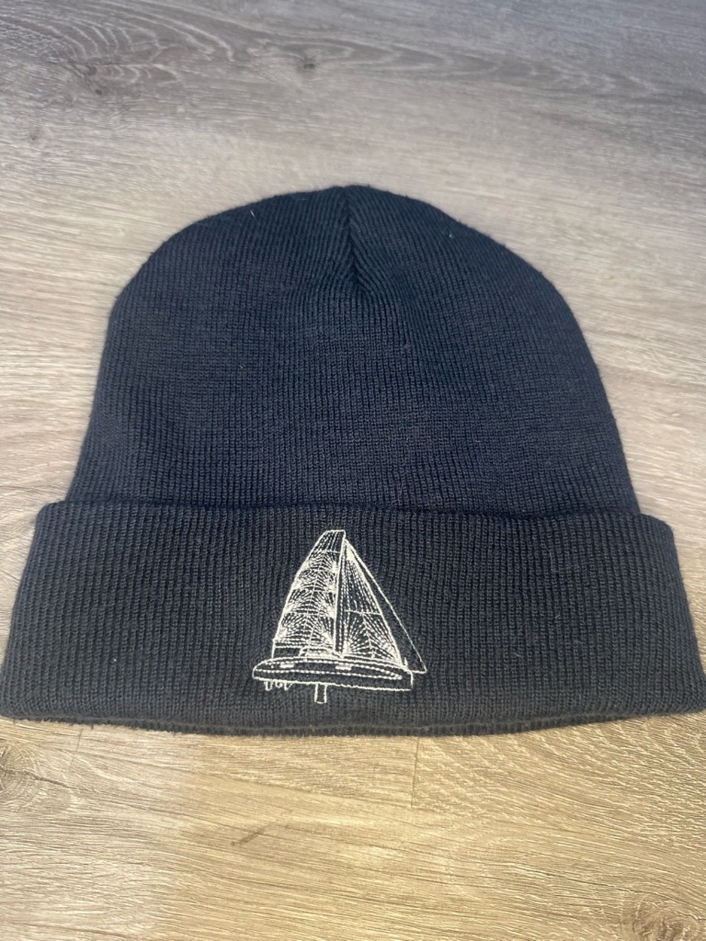 Vagabond Black Knit Beanie with White Sailboat Embroidery